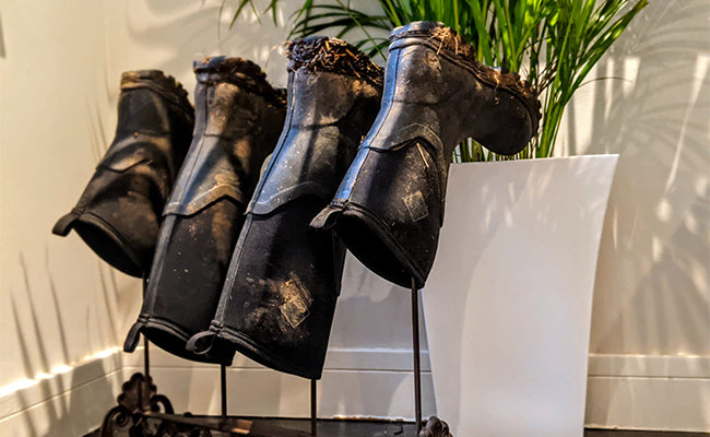 Boots drying on a rack
