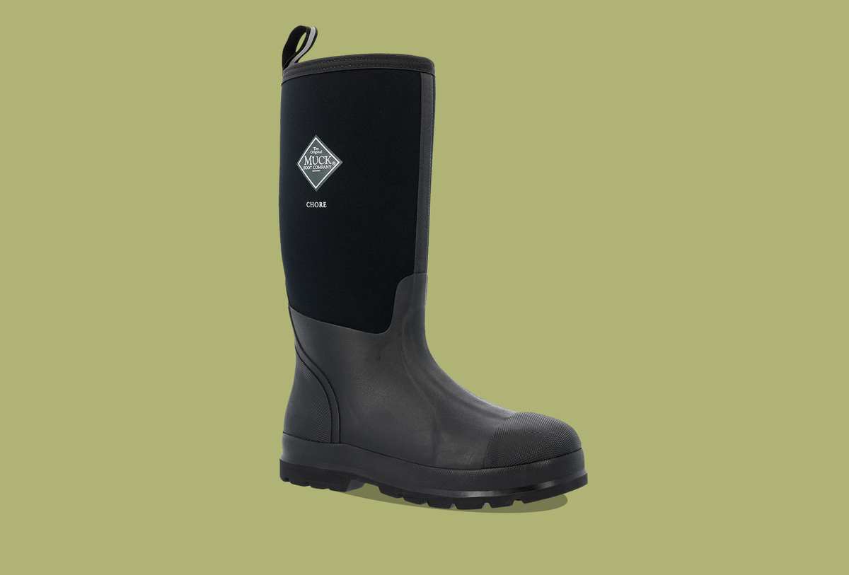 Muck Boot Chore wellington on a green background
