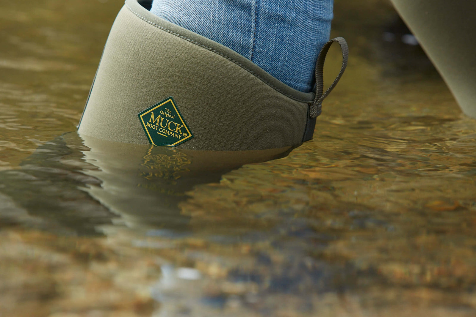 Close-up of a Muck Boots wellington submerged in water