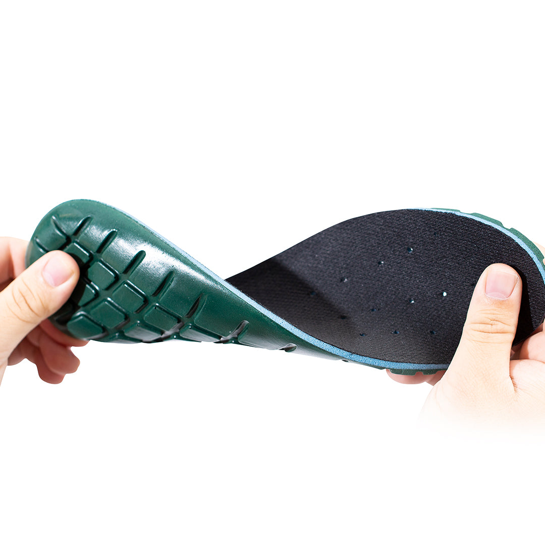 Person holding an insole